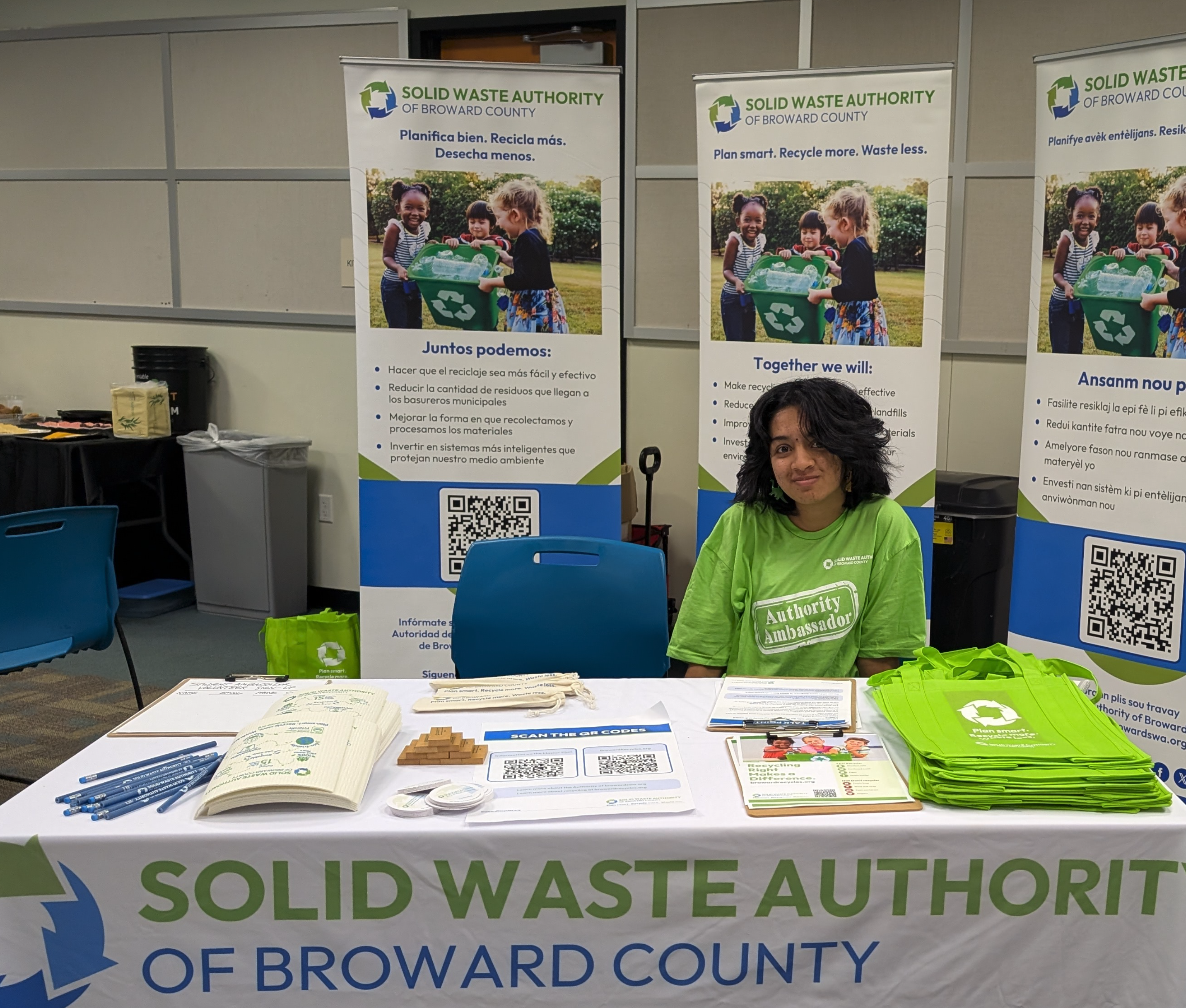 Two girls lifting a recycling bin with the text The Master Plan is Ready! 